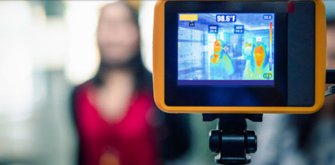 Thermal Imaging Camera Viewing Women In Classroom Setting