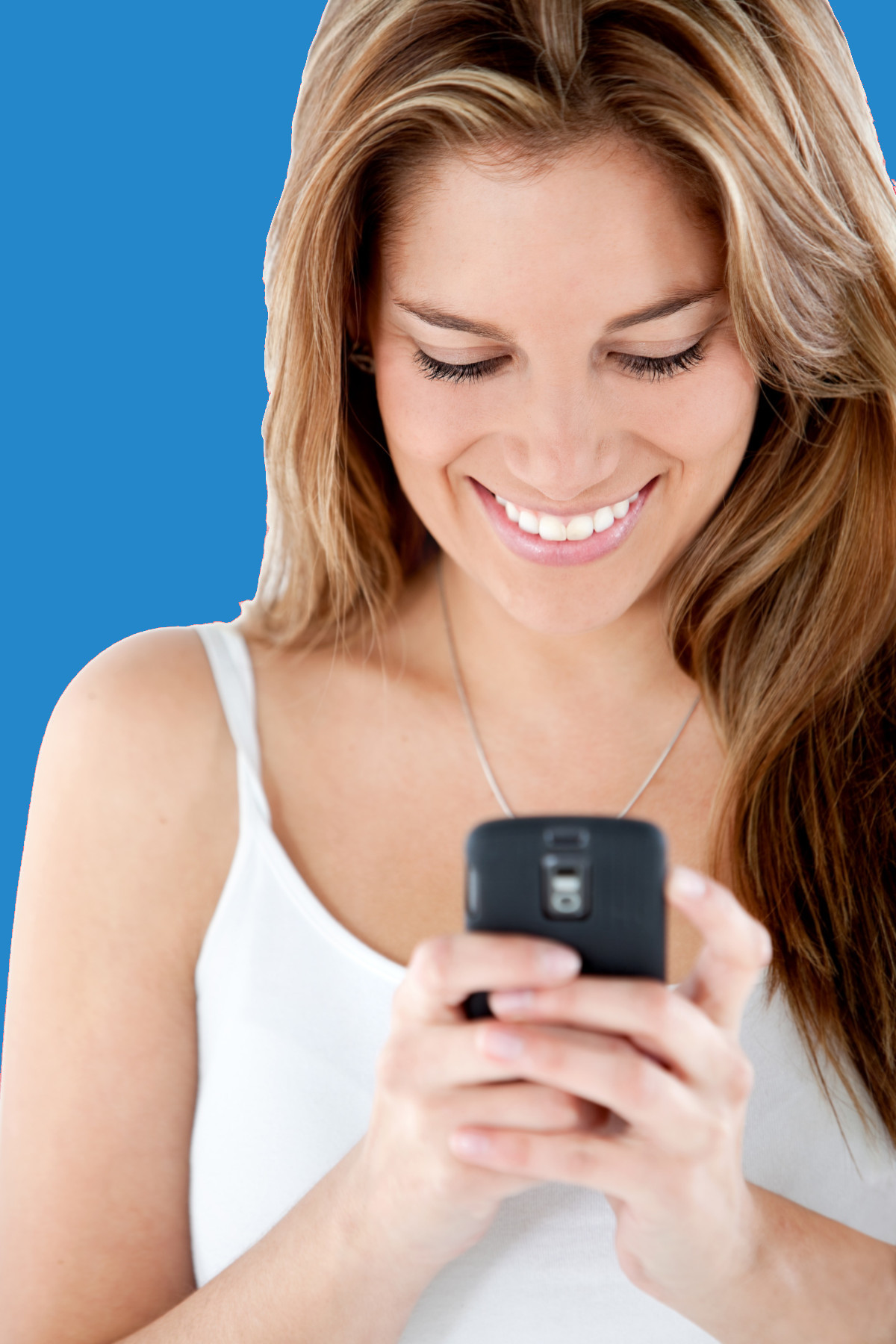 A women looking down and smiling at her phone