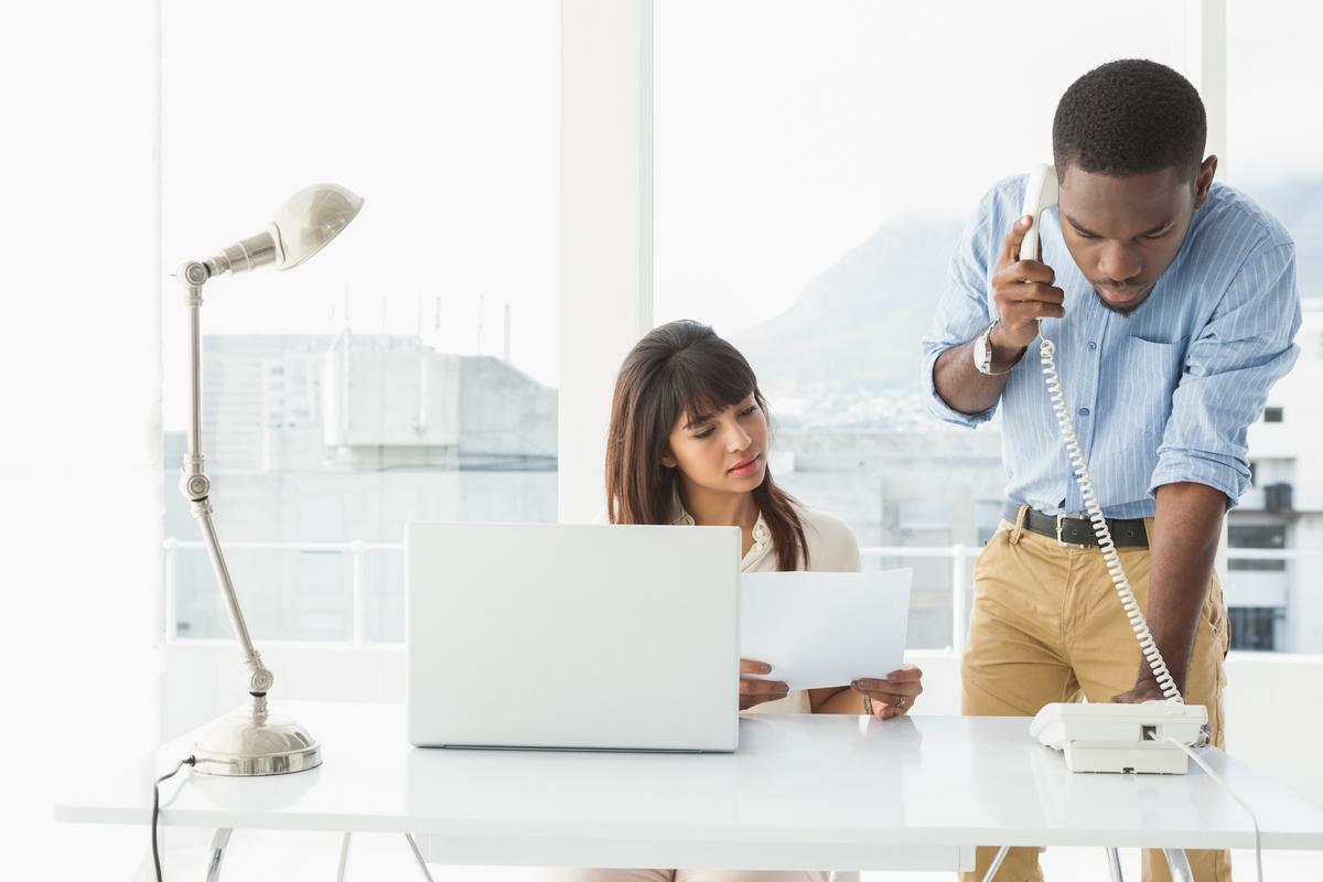 Man and woman in an office working