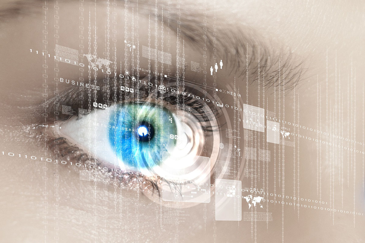 The double exposure image of woman's eye with data/computer code overlay. Cyber security concept.