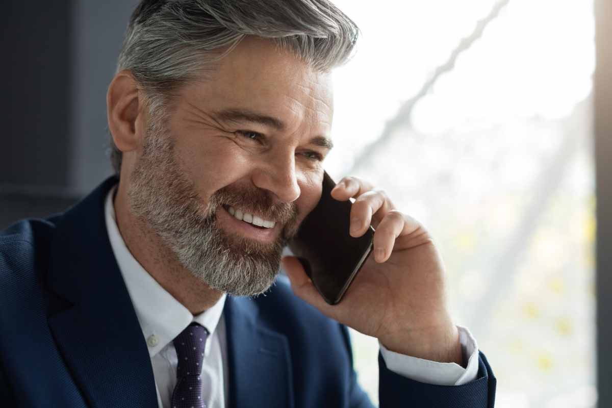 Businessman talking on mobile phone.