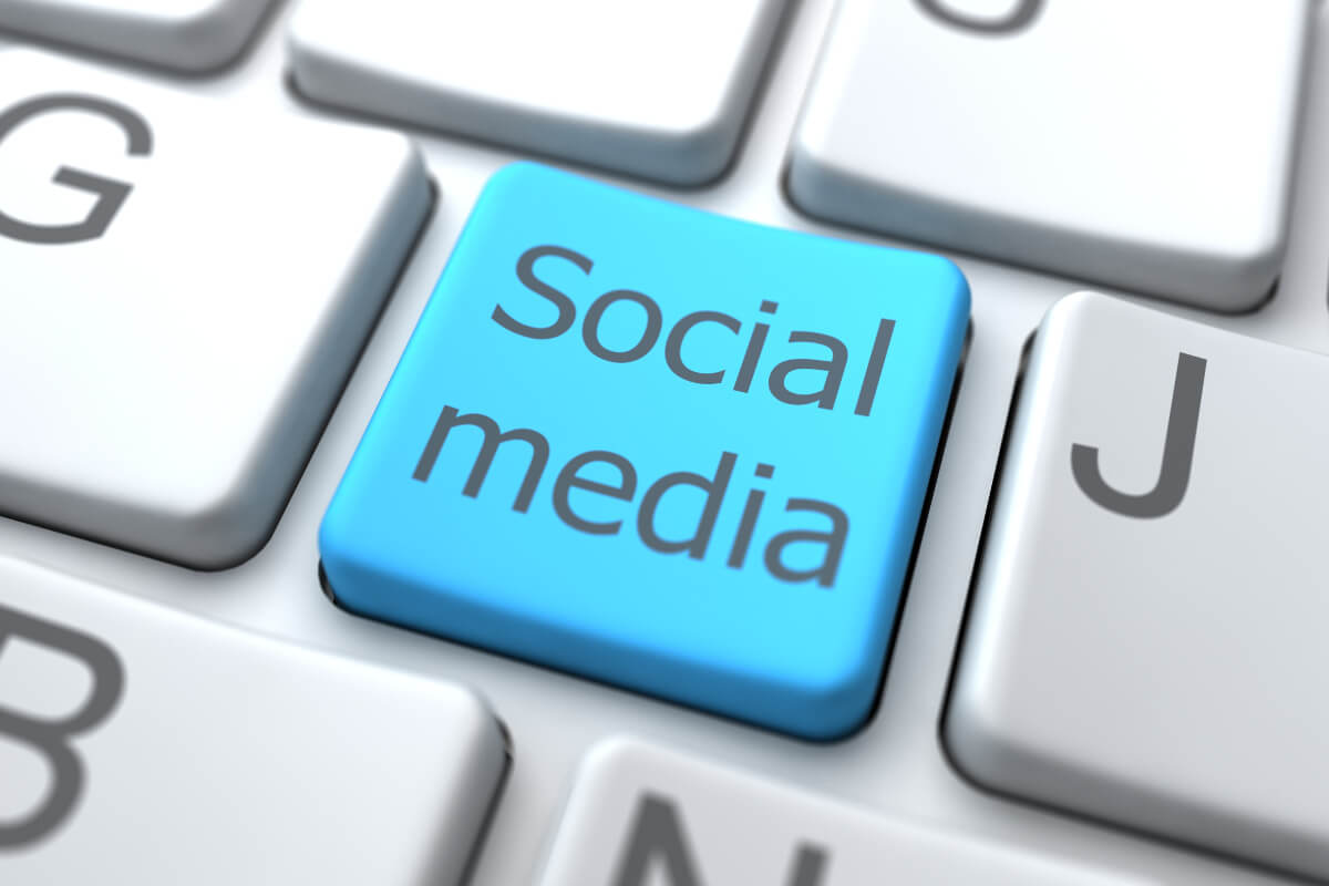 Social media button occupying the 'H' location on a keyboard, close up